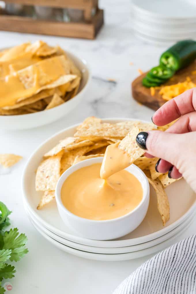 chip dipping in sauce