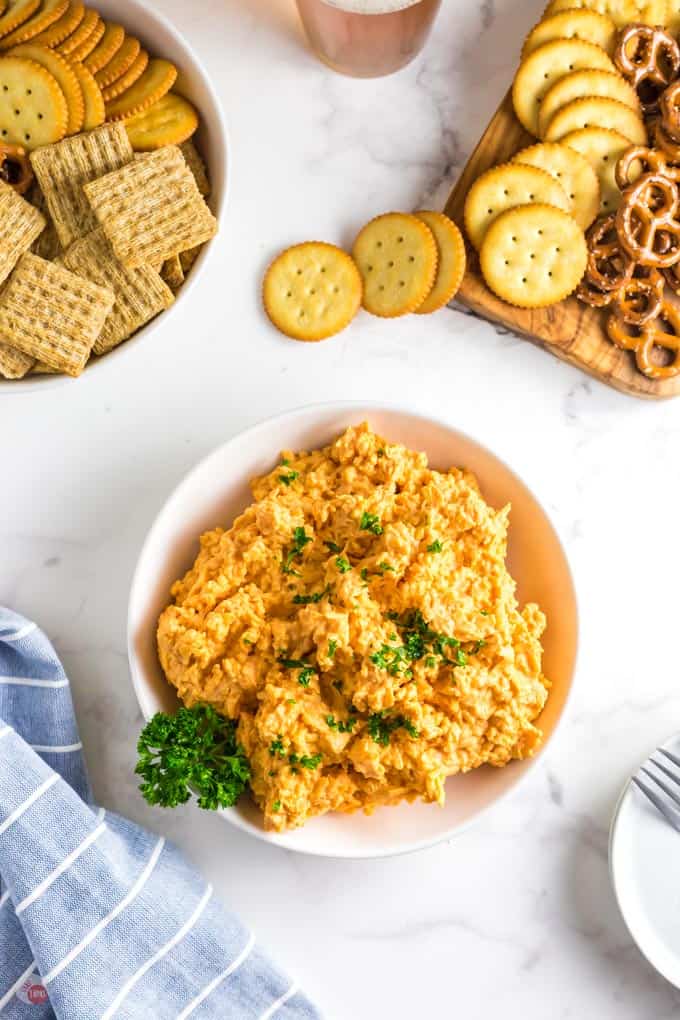 cheese spread in a bowl with crackers