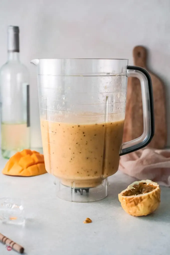 mango wine slushie in a blender