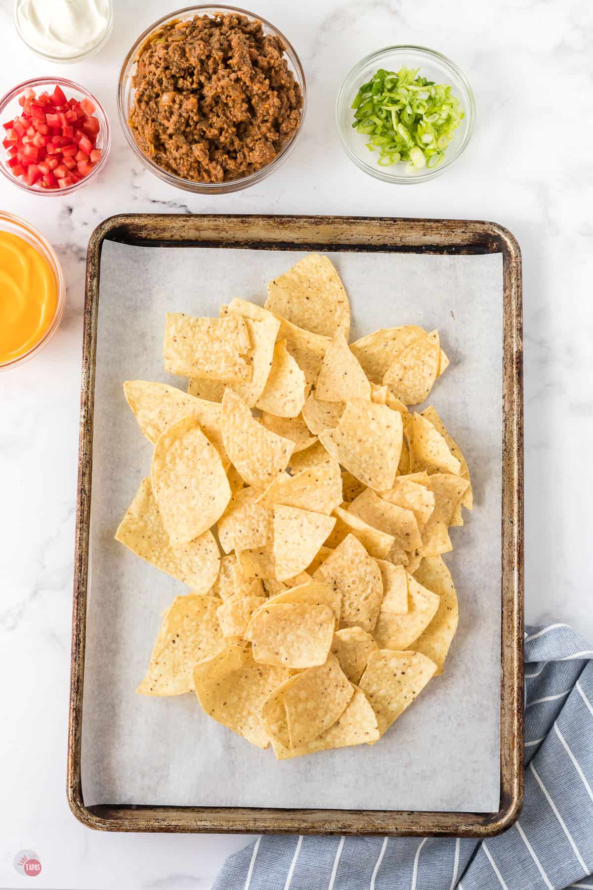 tortilla chips on sheet pan