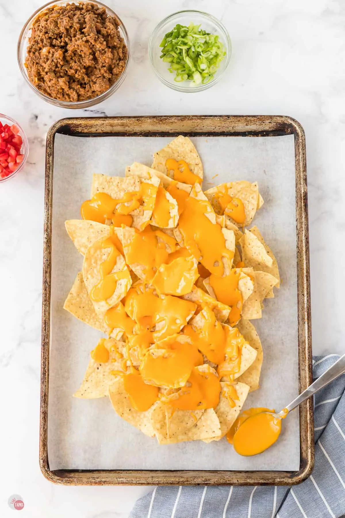 cheese and chips on sheet pan