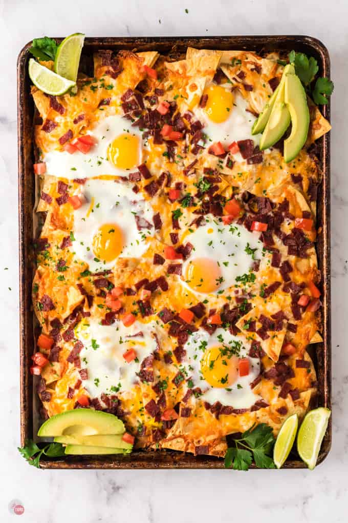 breakfast nachos on a baking sheet