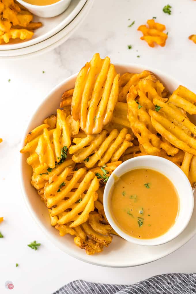 overhead of fries and chick fil a sauce