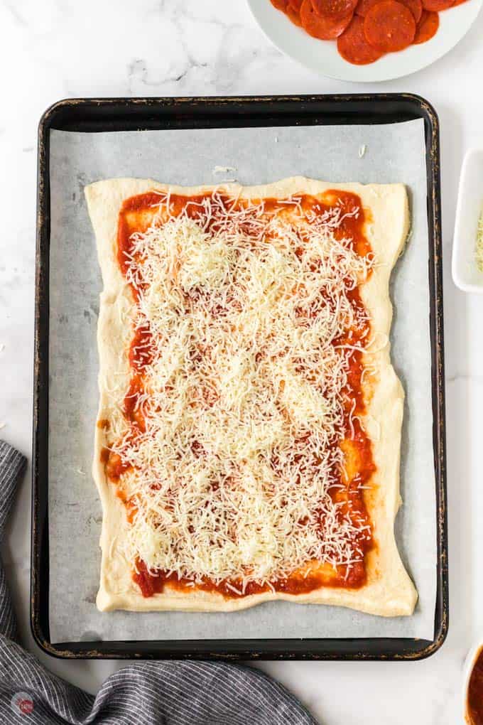 pizza dough, sauce, and cheese