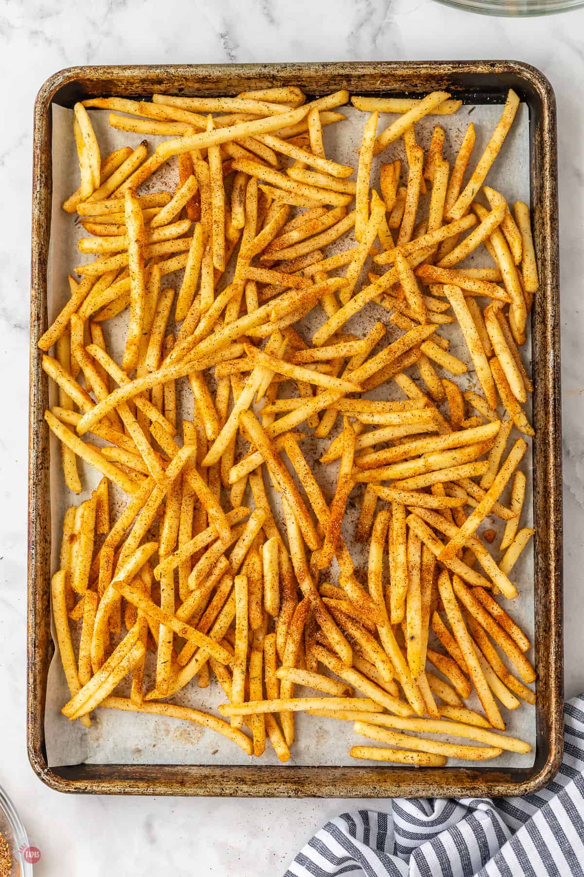 french fries on a baking sheet