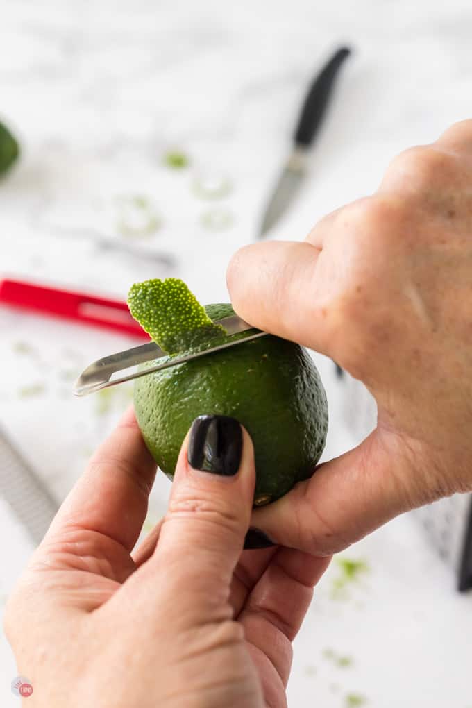 vegetable peeler and hand