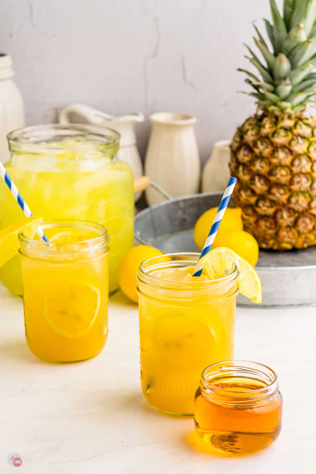 two glasses of pineapple bourbon lemonade