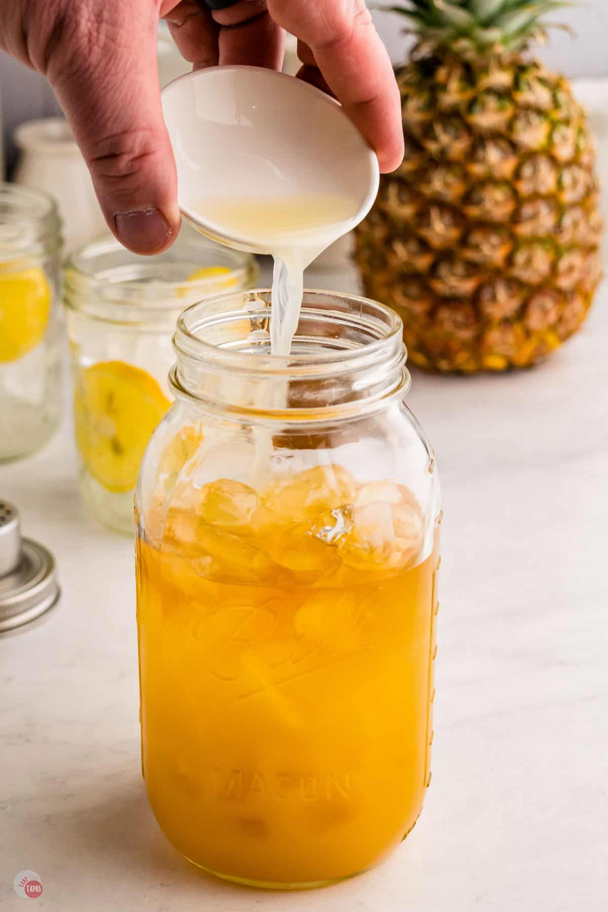 pineapple juice in a mason jar