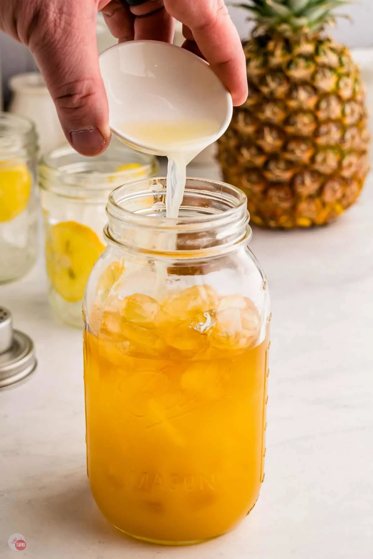 pineapple juice in a mason jar