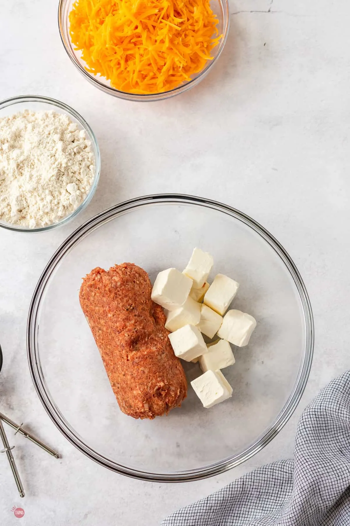 sausage and cream cheese in a large mixing bowl