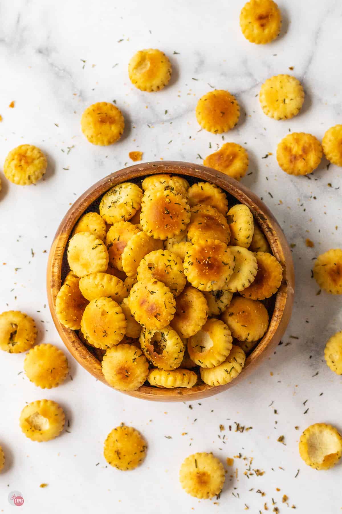 wood bowl of seasoned oyster crackers