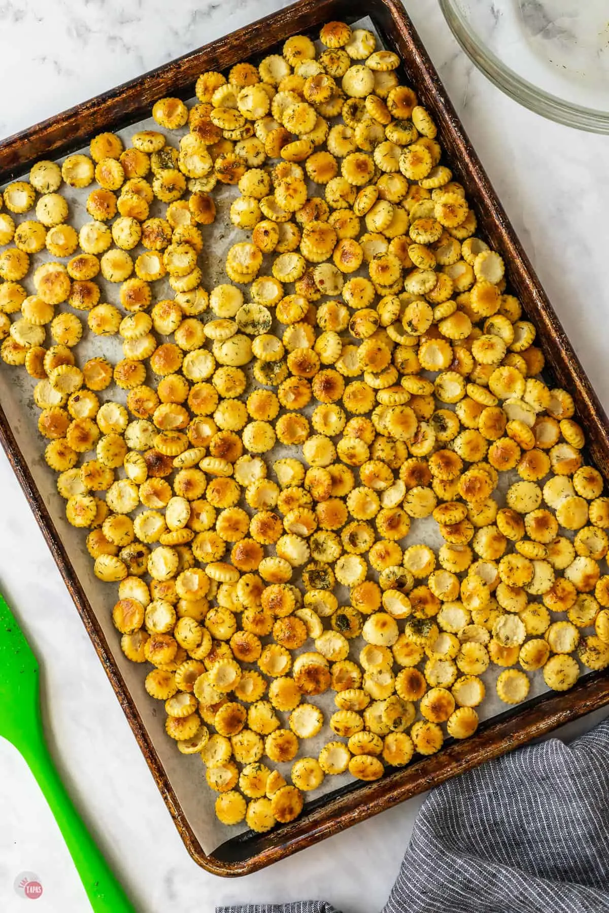 oyster crackers on a baking sheet