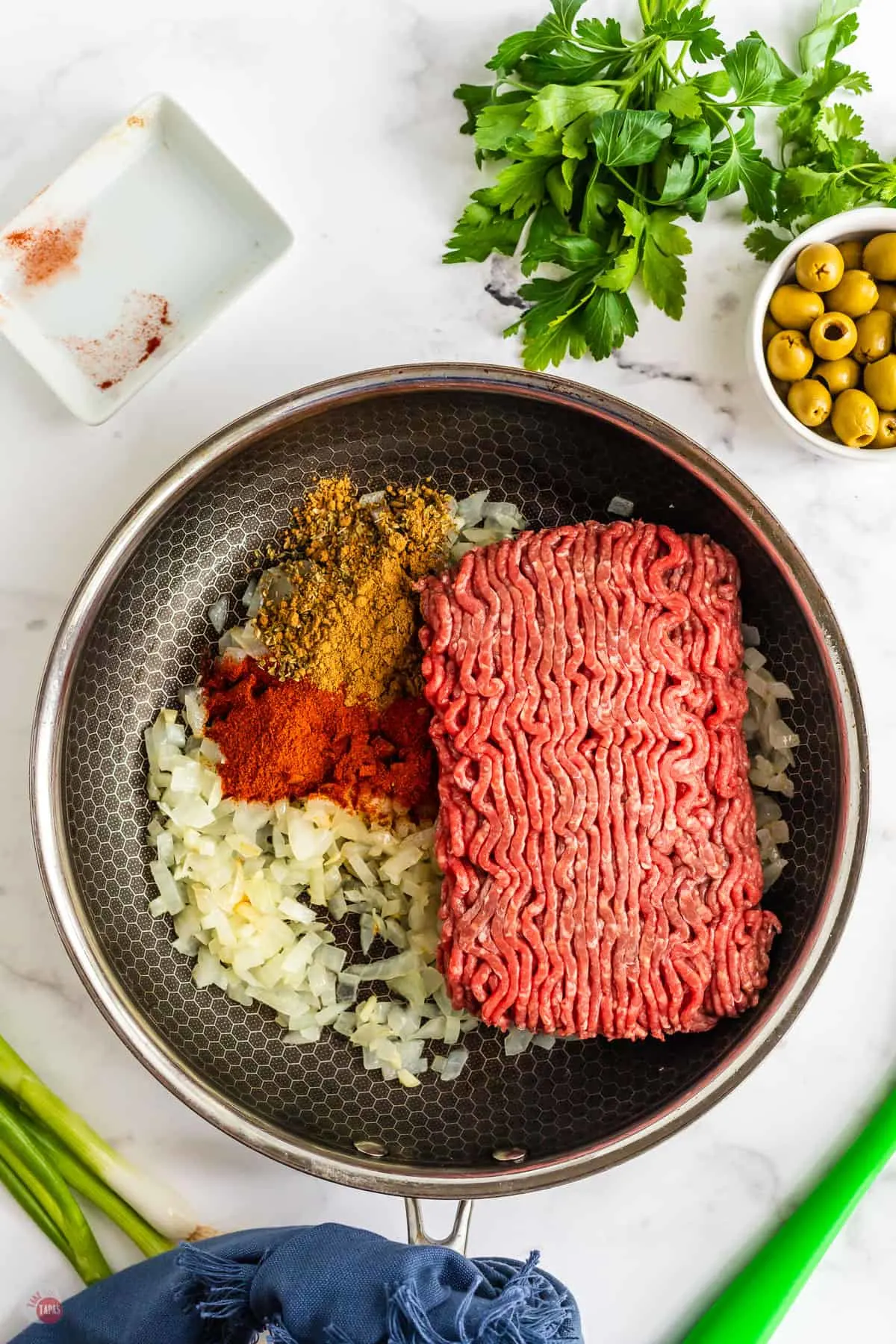 beef and onions in a pan