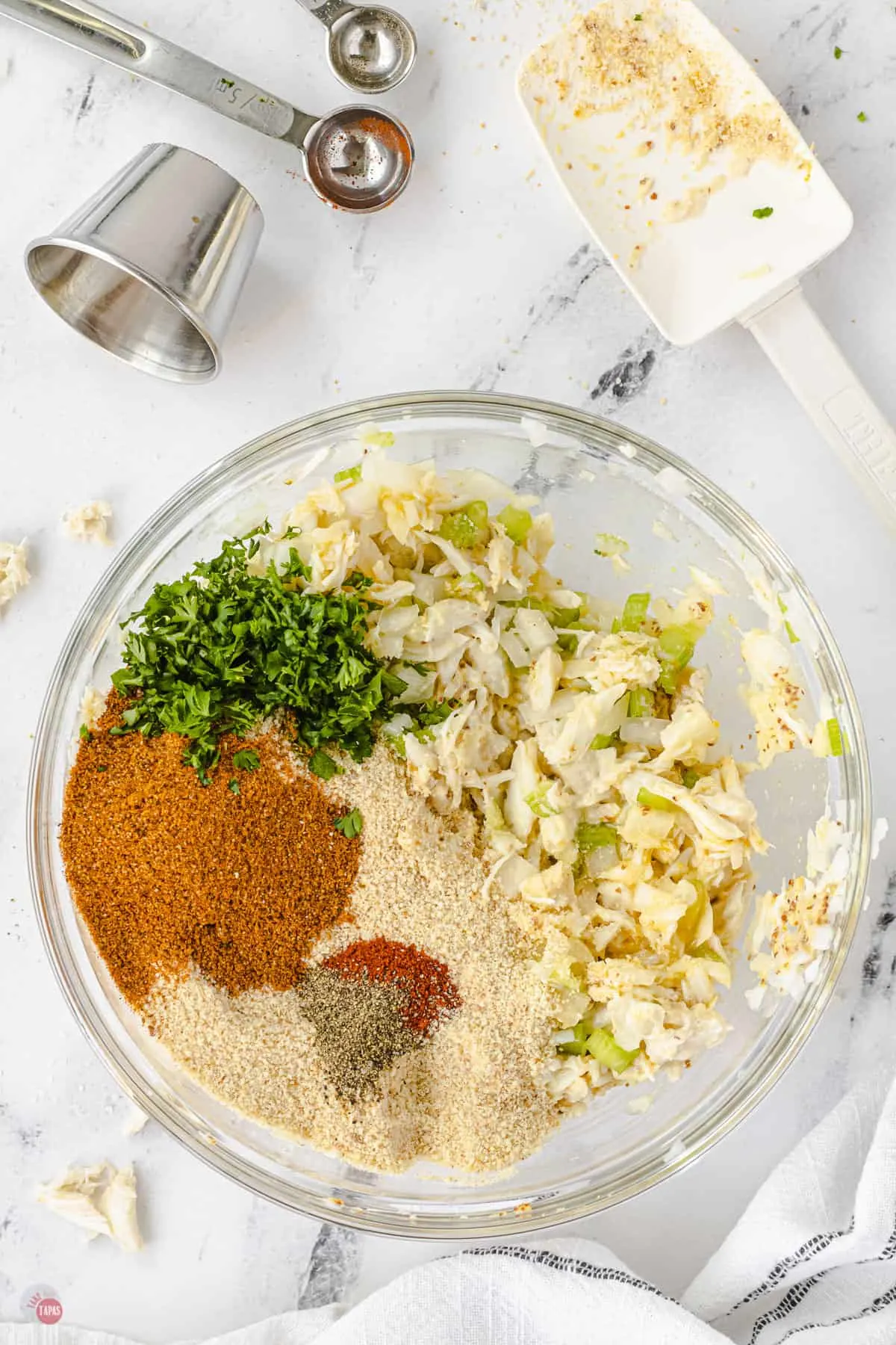 spices and jumbo lump crabmeat in a bowl