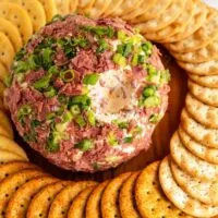 chipped beef cheese ball with scoop missing