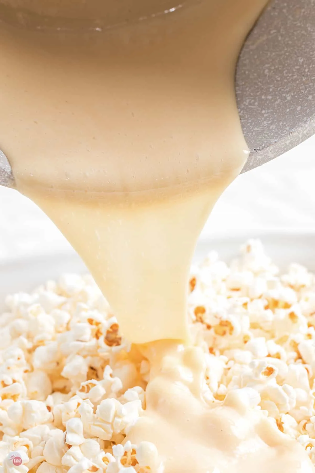 marshmallows pouring over popcorn