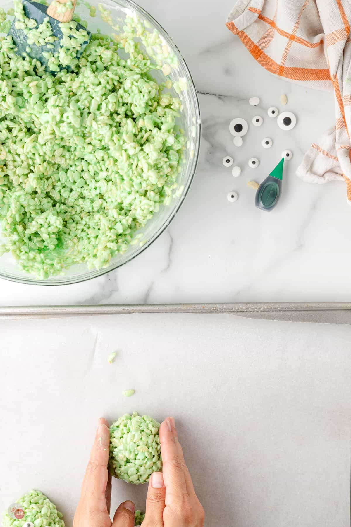 hand shaping a marshmallow treat