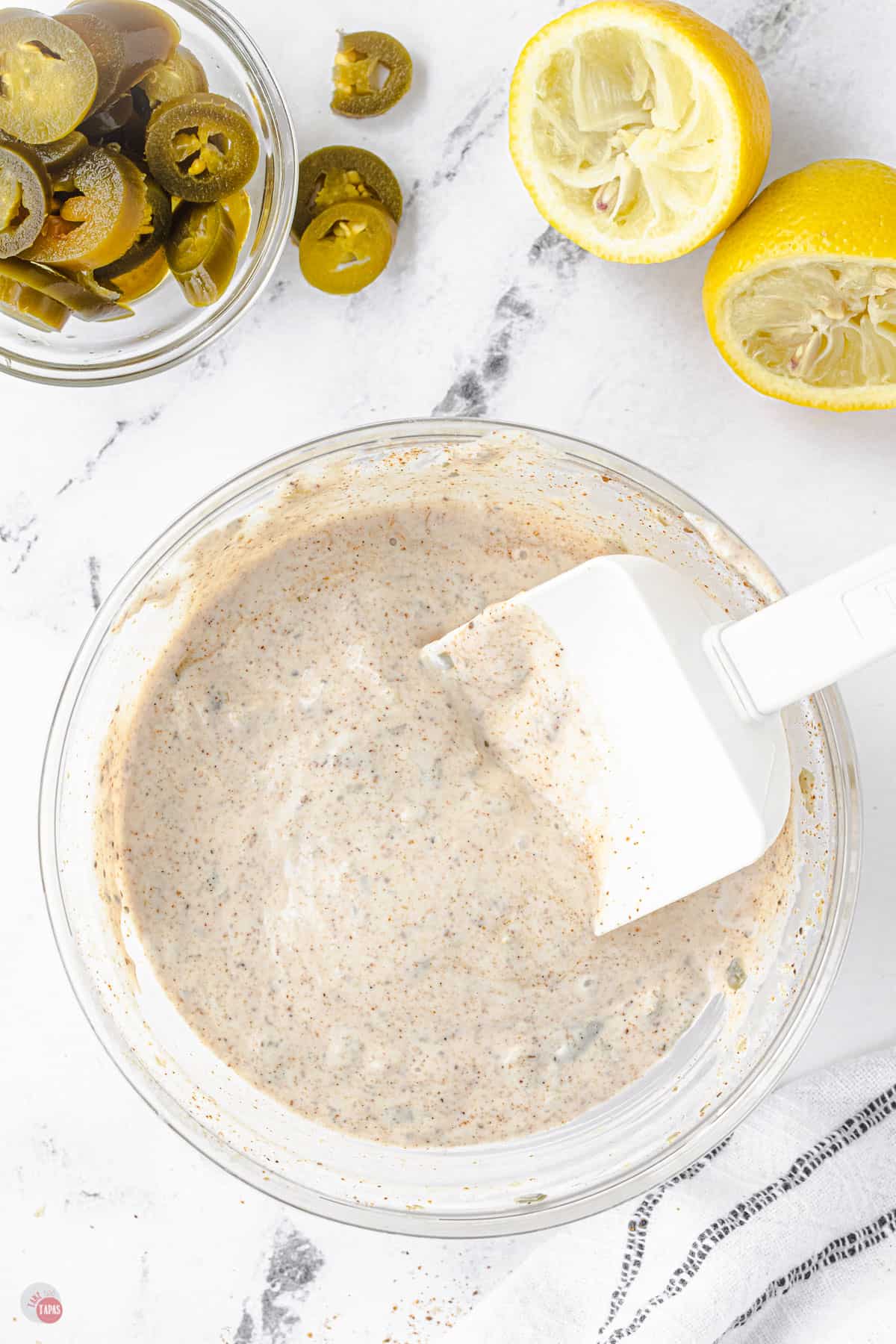 bowl of tartar sauce with spatula