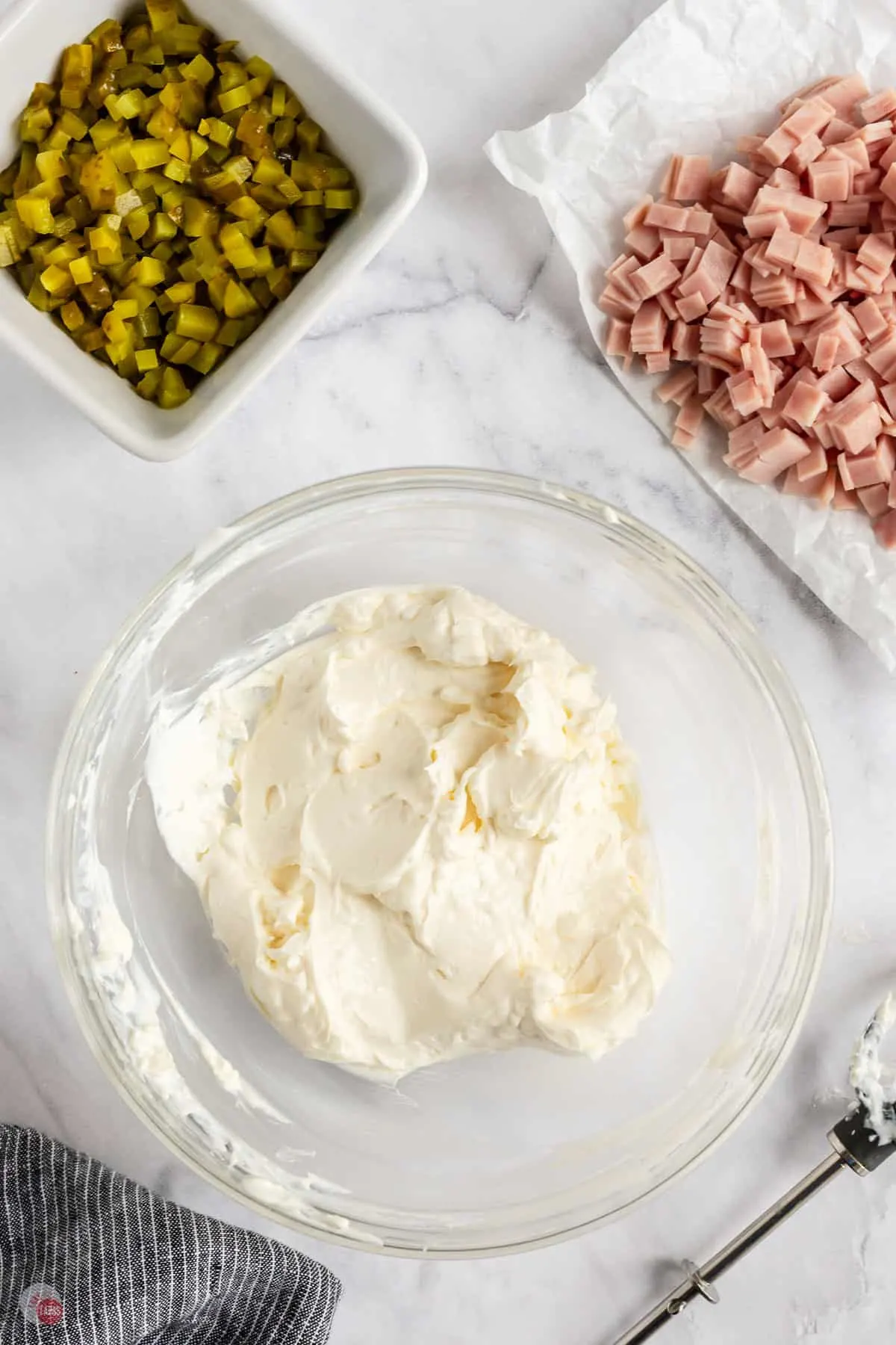 cream cheese and sour cream in a bowl