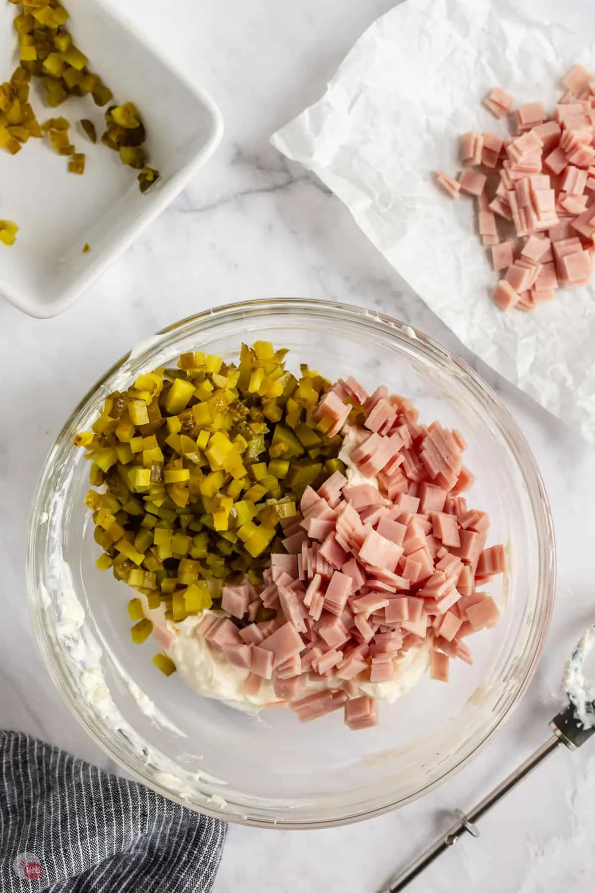 pickles and ham in a bowl