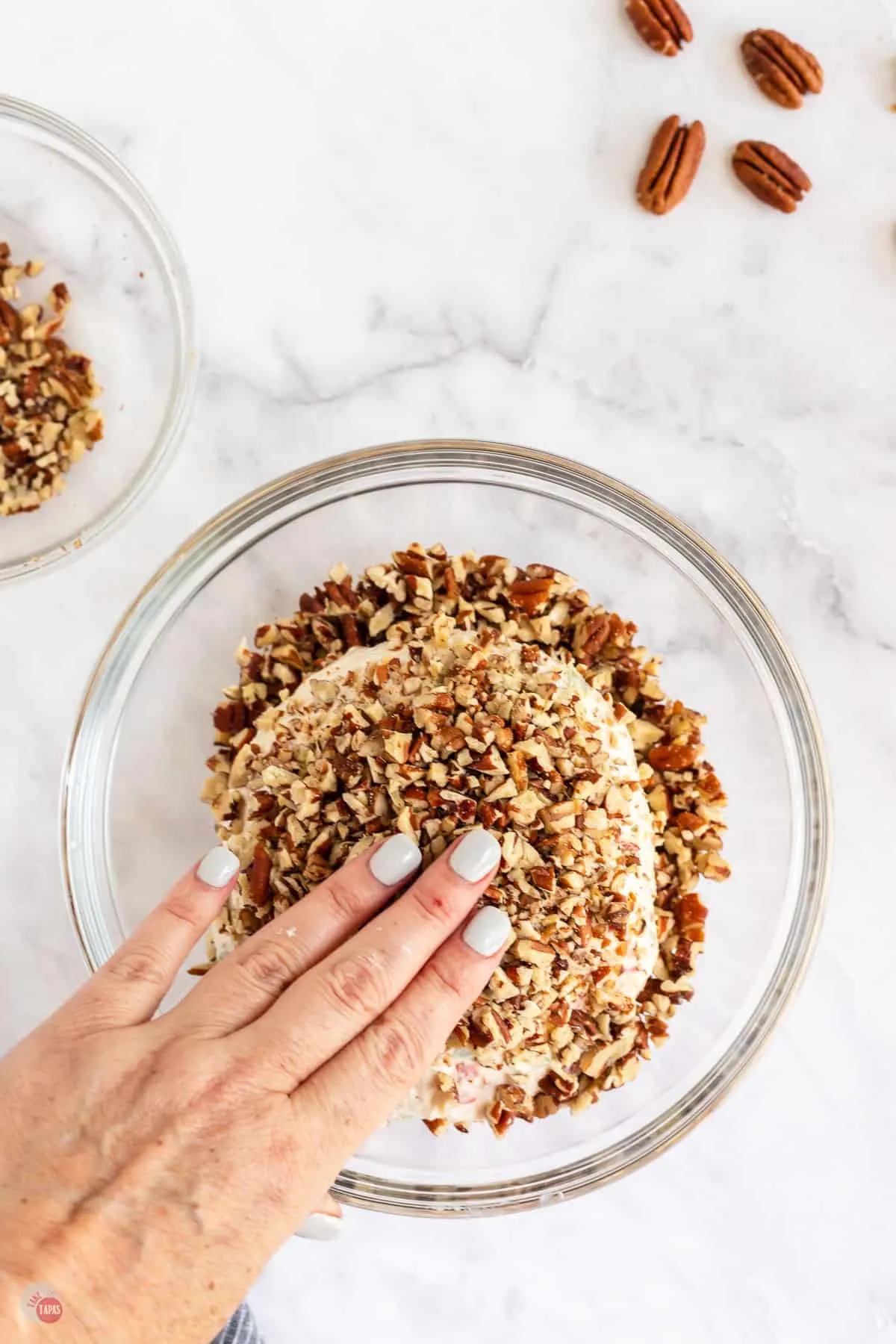 hand with pecans