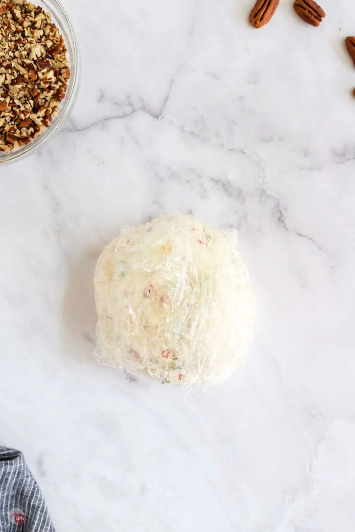 cheese ball in plastic wrap