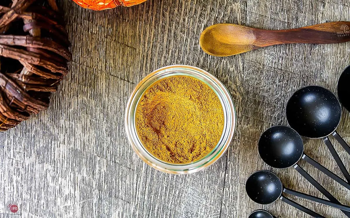 Overhead of pumpkin pie spice in a jar