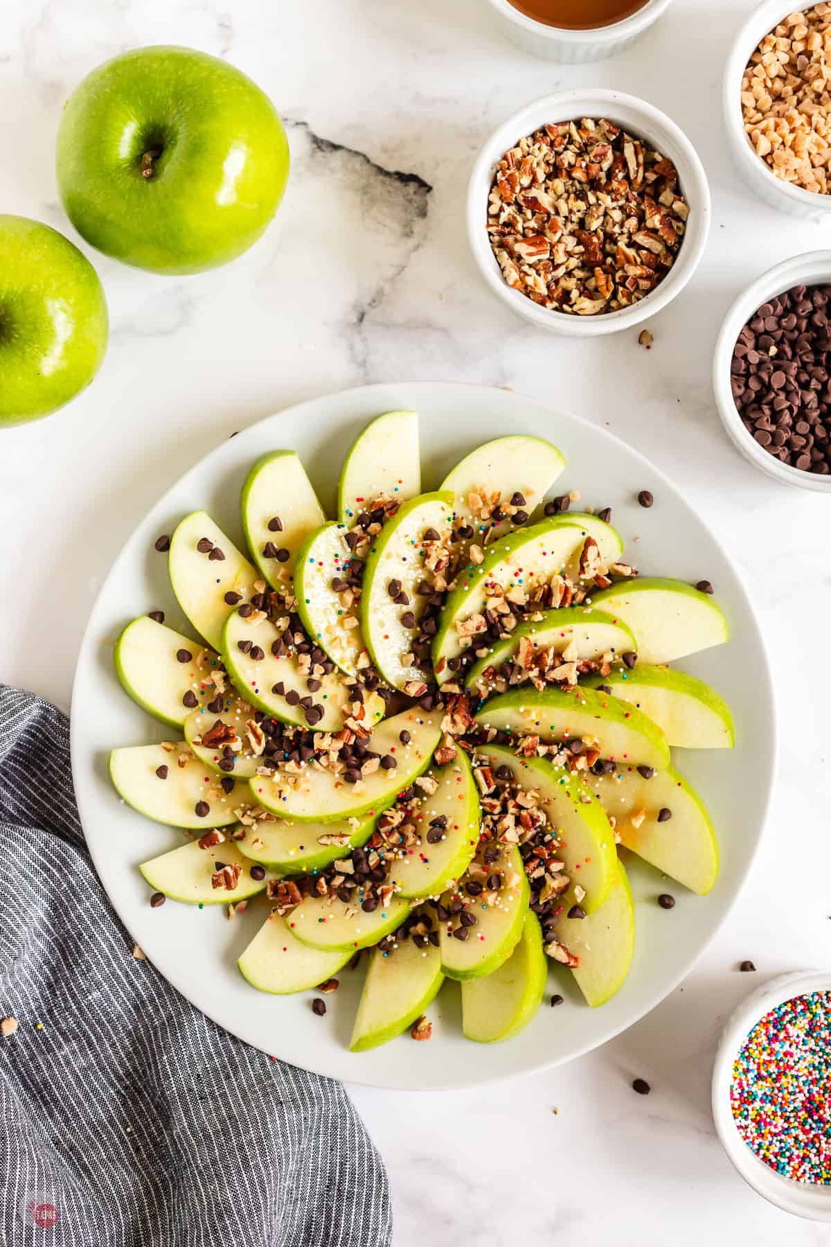 apple nachos on a white plate