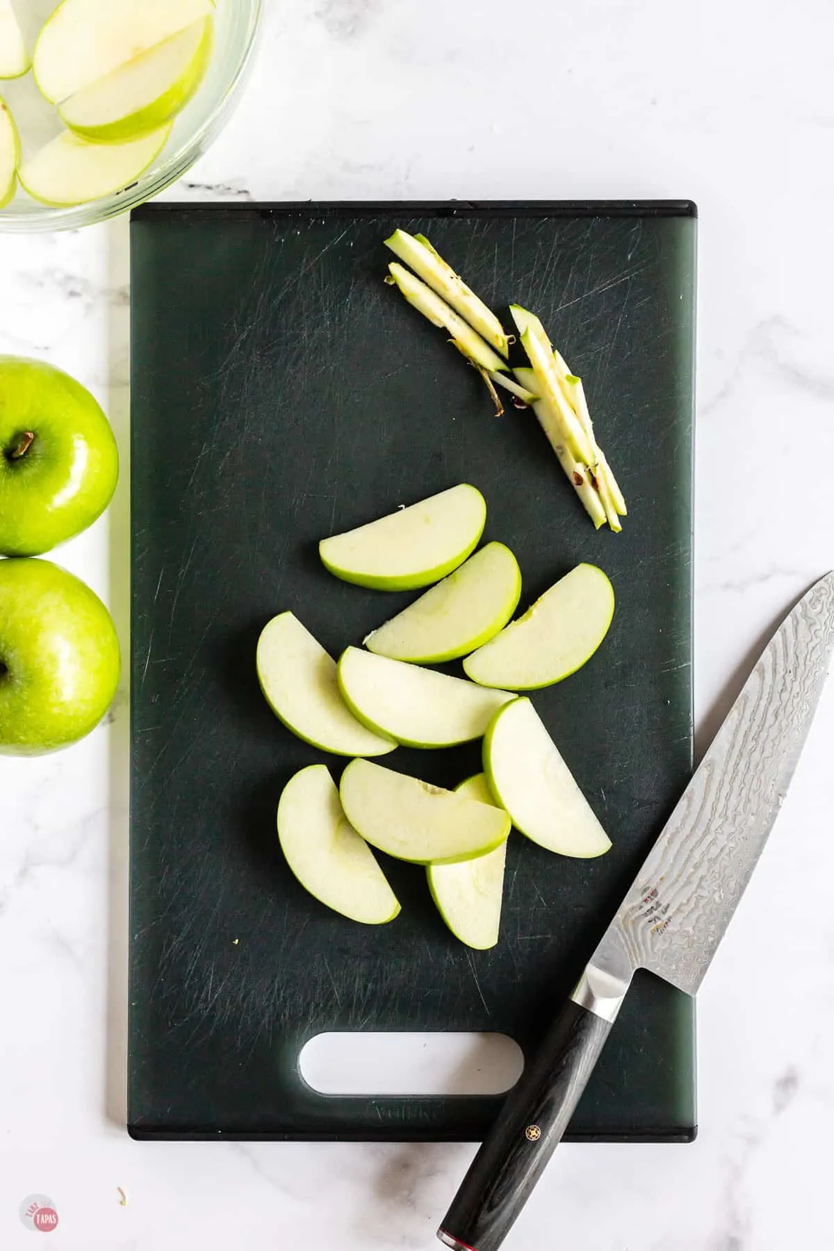 apple slices on cutting board