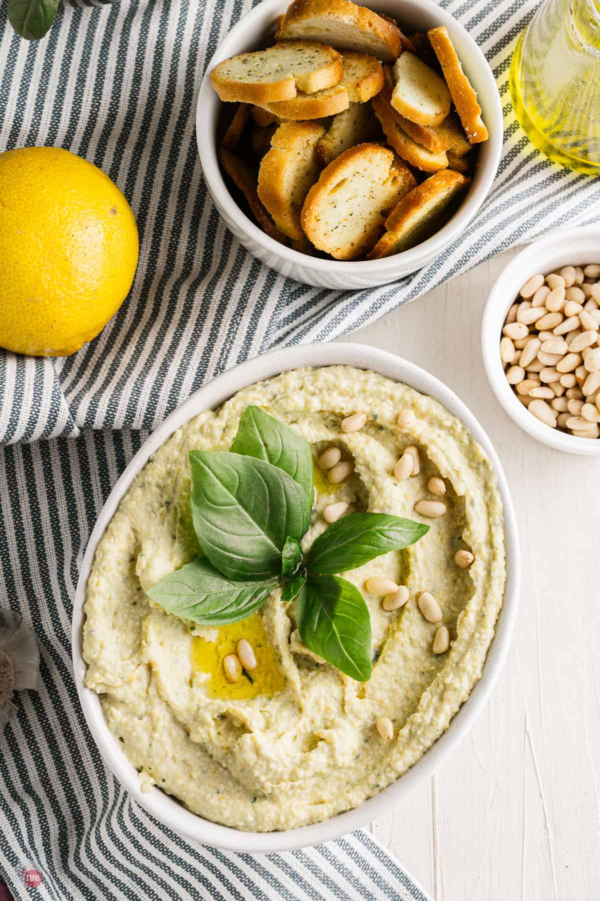 basil pesto hummus in a bowl