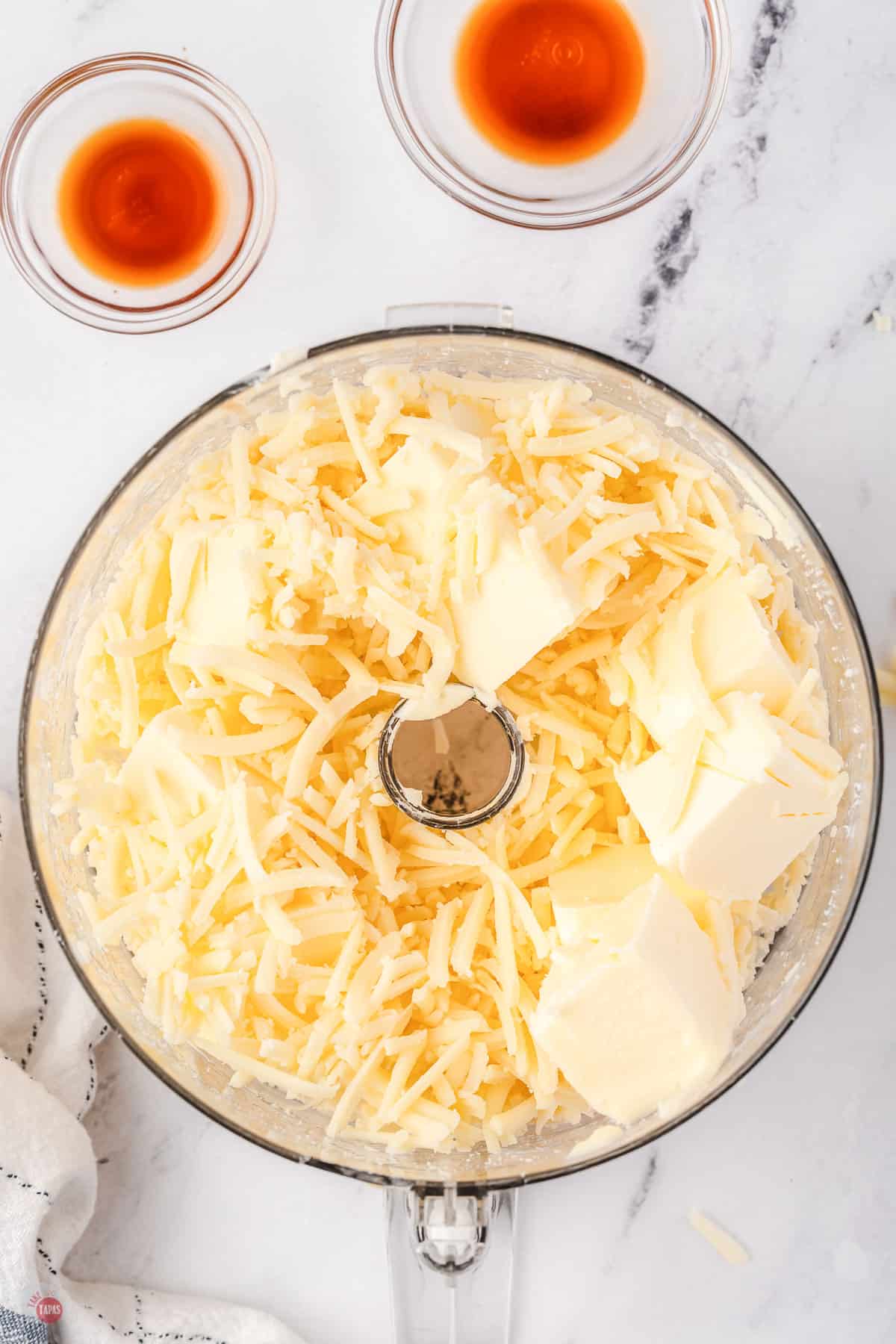 cheese and butter in processor