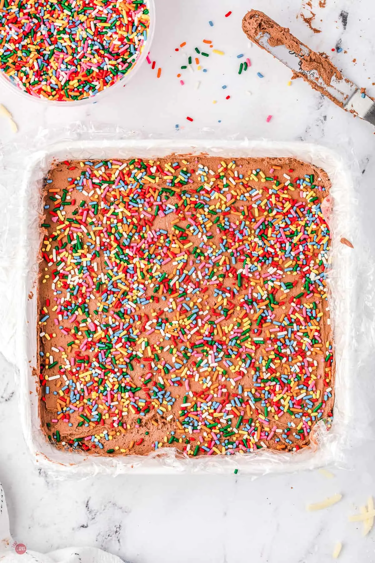 creamy cheese fudge with sprinkles in a pan