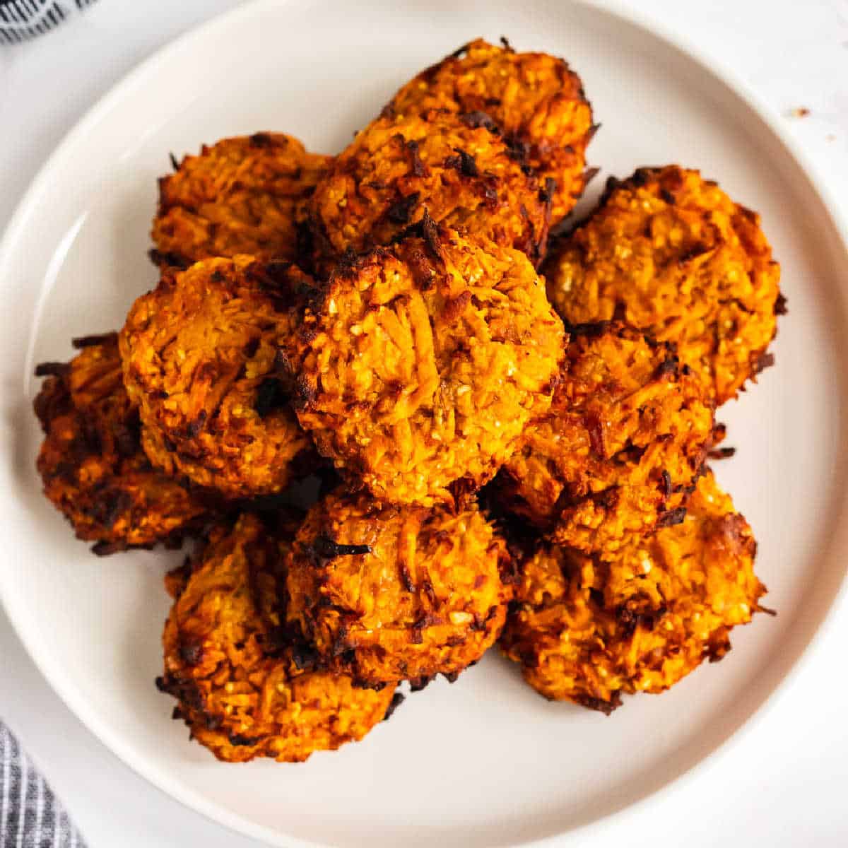 https://www.taketwotapas.com/wp-content/uploads/2021/09/Sweet-Potato-Latkes-Featured-Image.jpg