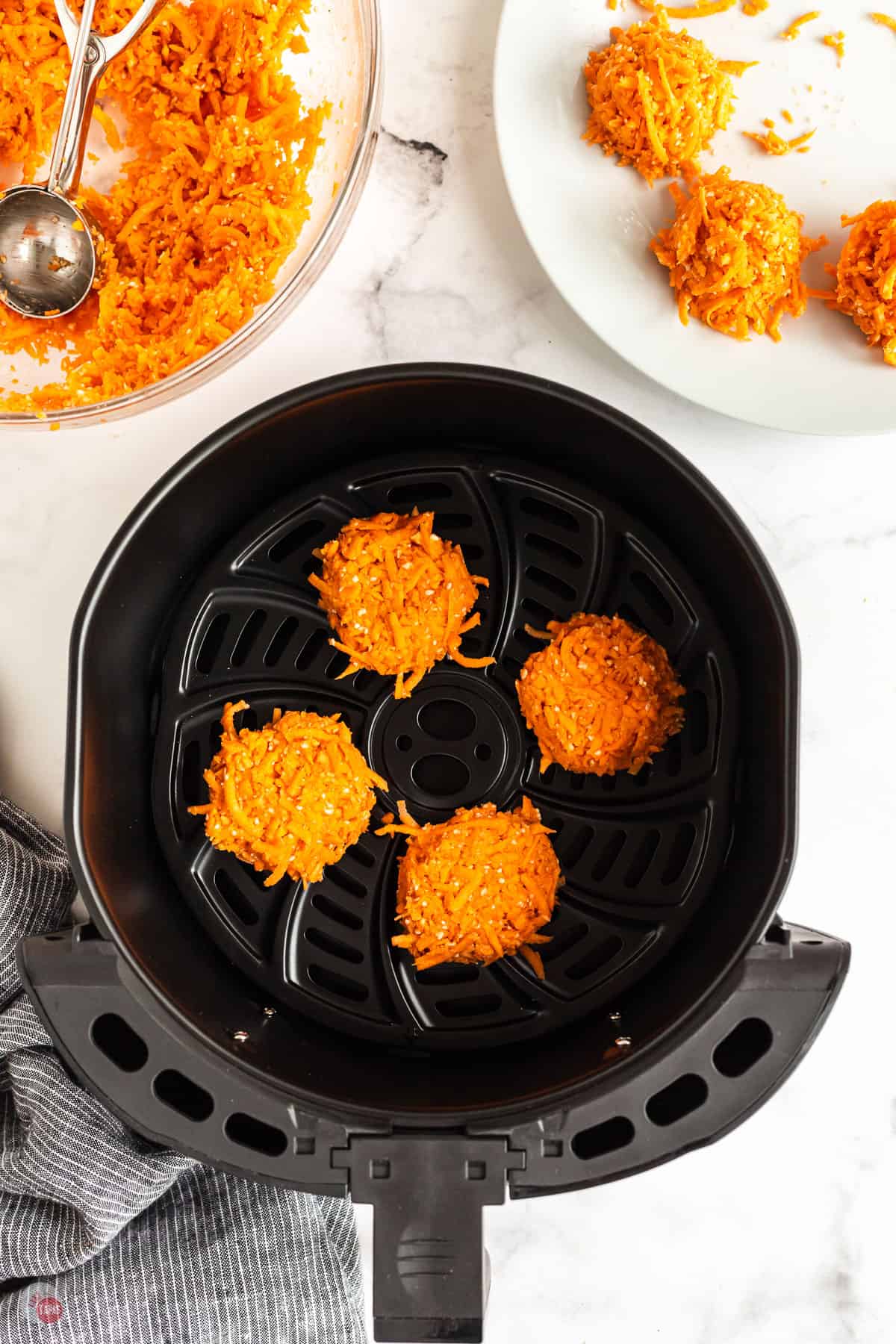 latkes in an air fryer basket