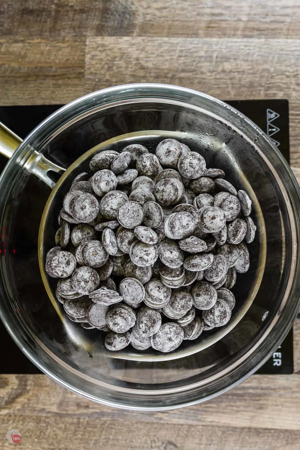dark chocolate wafers in a double boiler