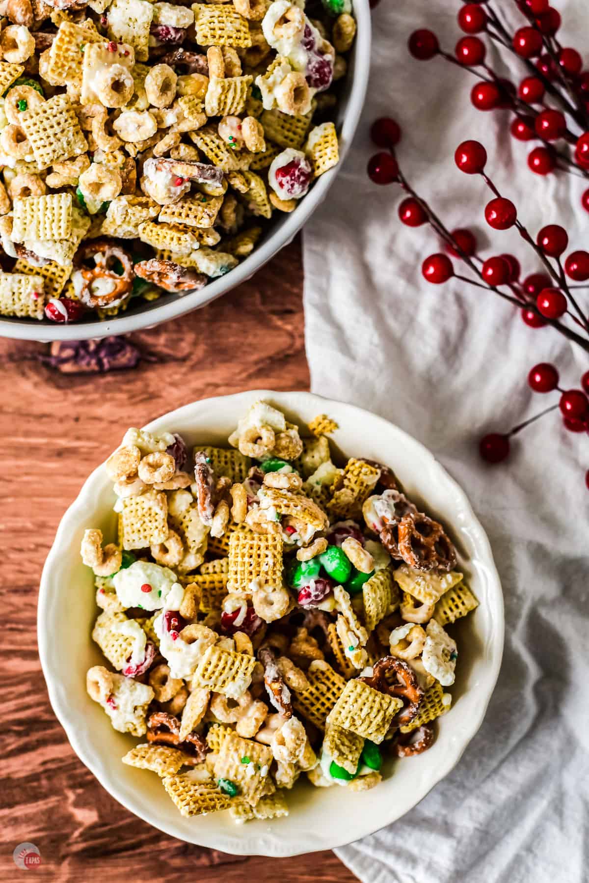 two bowls of Christmas Chex mix