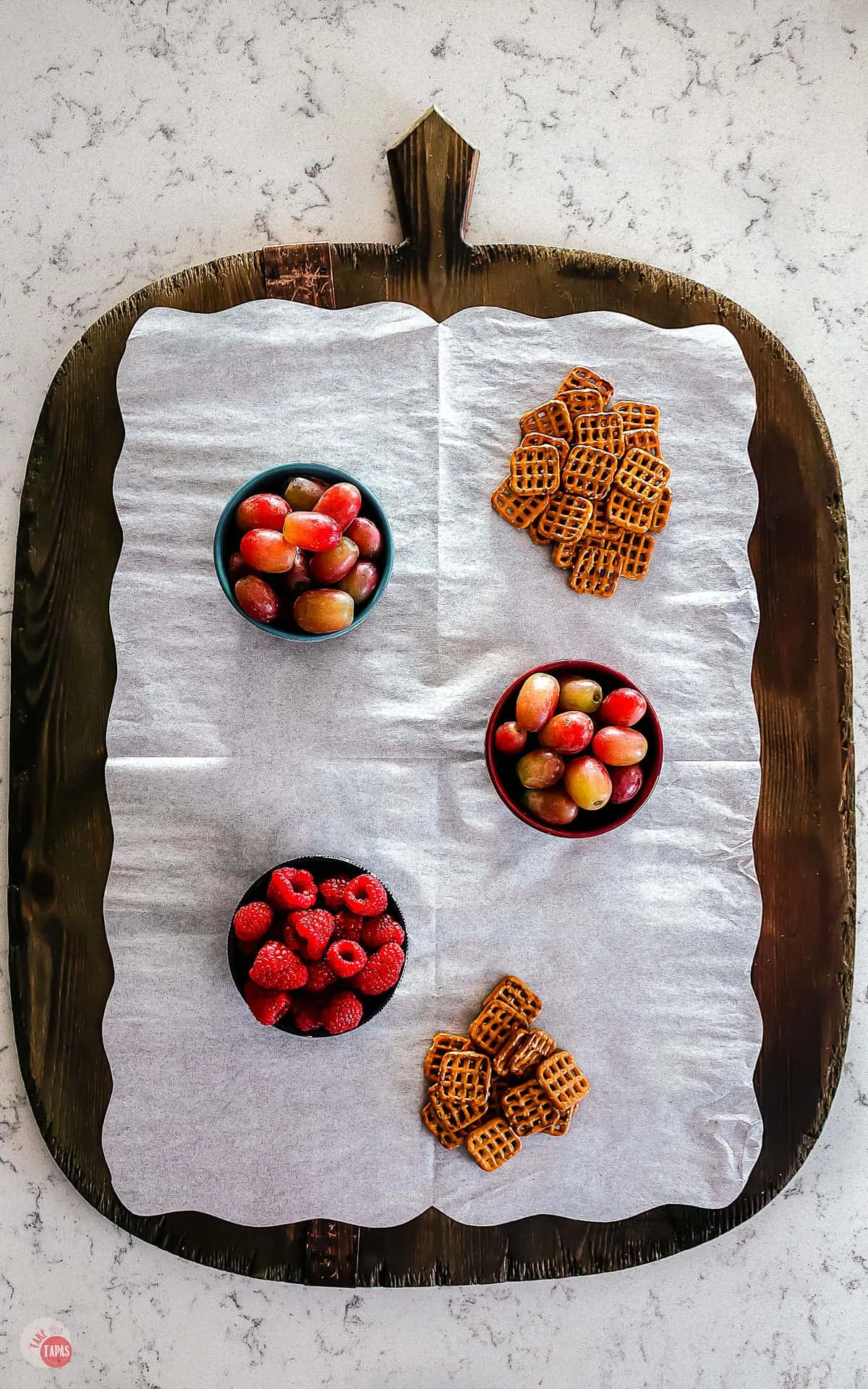 platter with fruit and pretzels