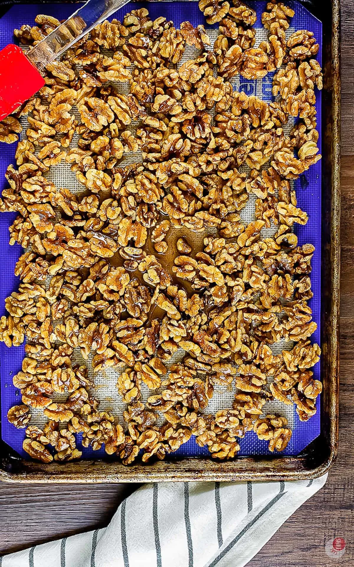 spices walnuts on a baking sheet