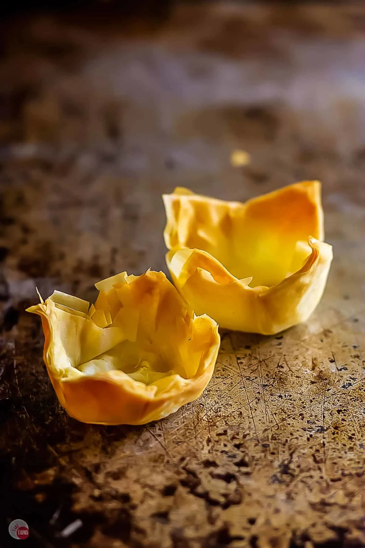 square phyllo cups on a pan