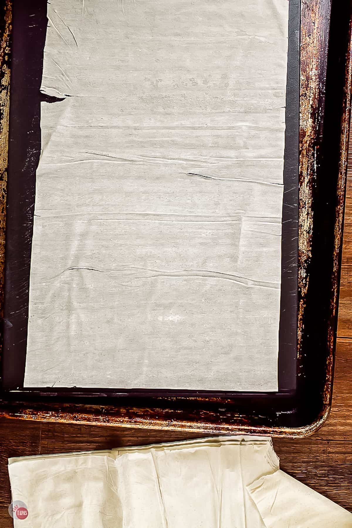sheet of phyllo dough on a baking sheet