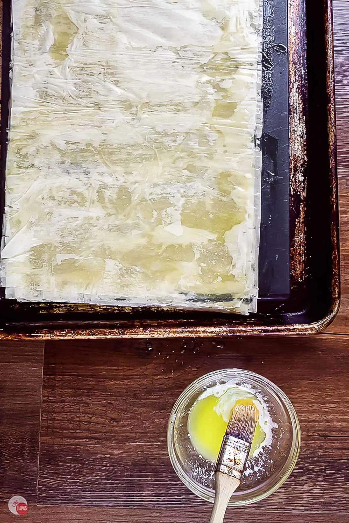 stack of phyllo sheets with butter