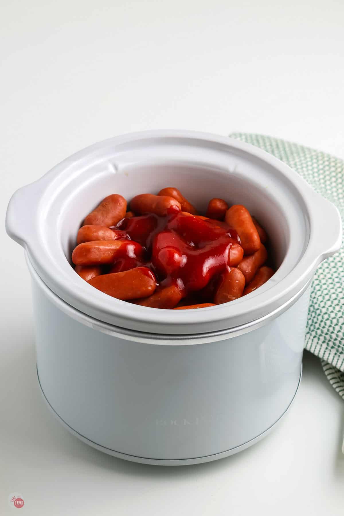 mini sausages in crockpot with sauce