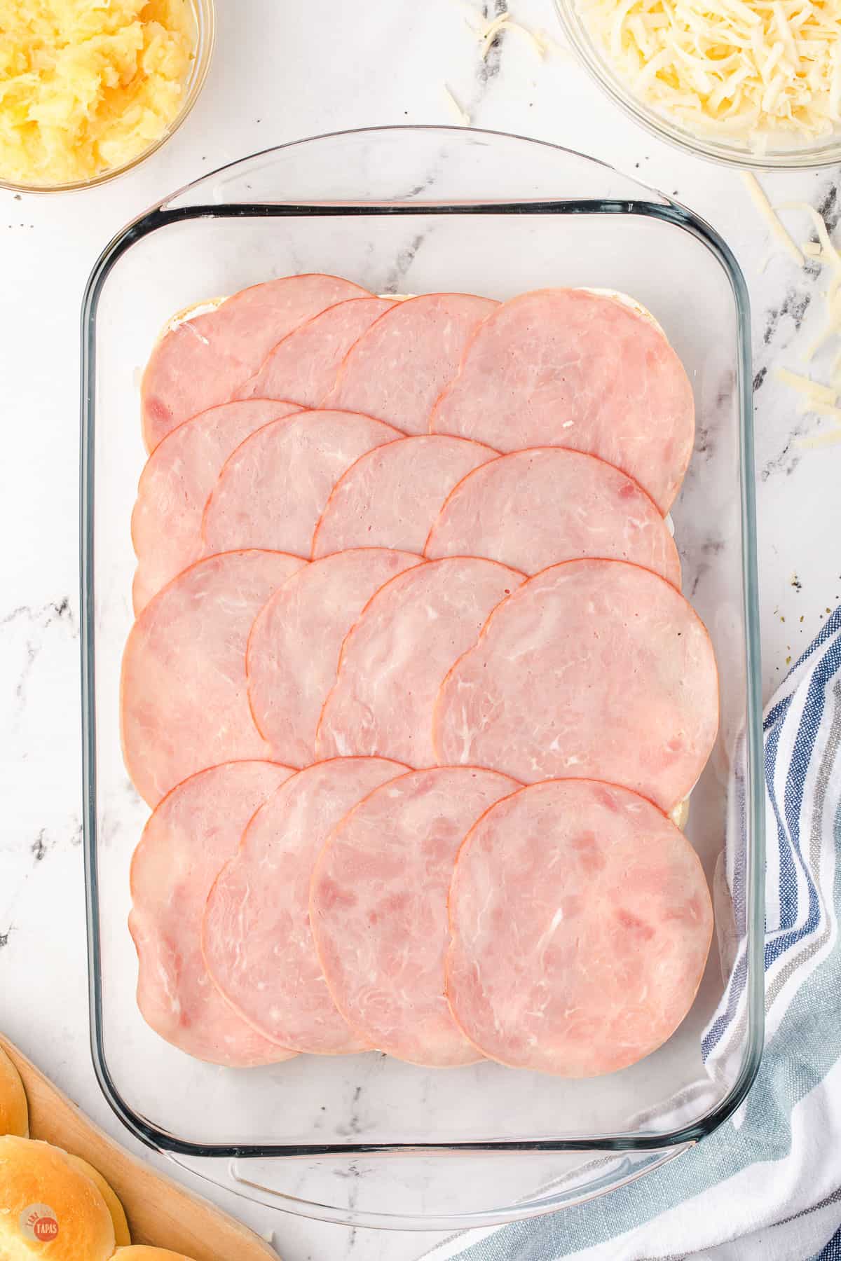 slices of ham in a pan