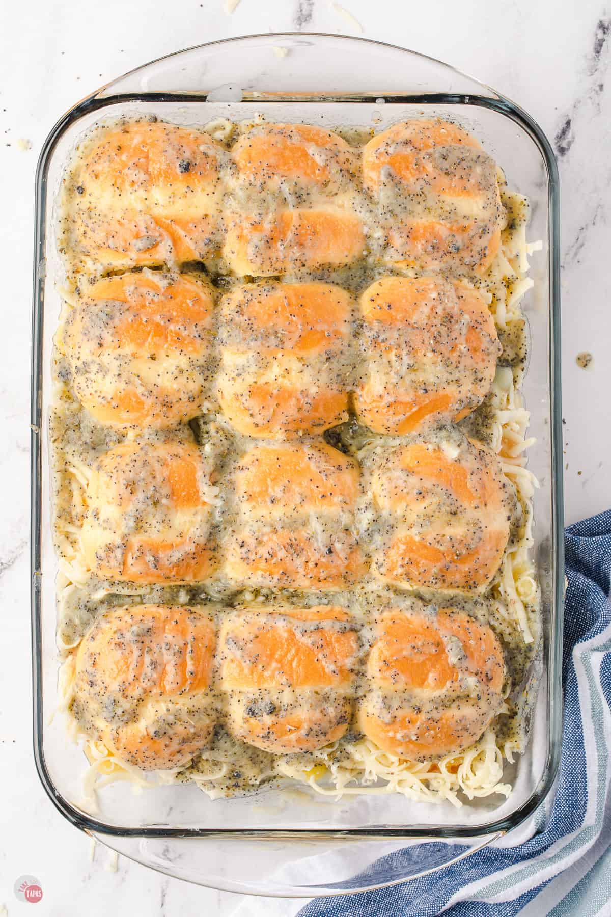 unbaked sliders in a pan