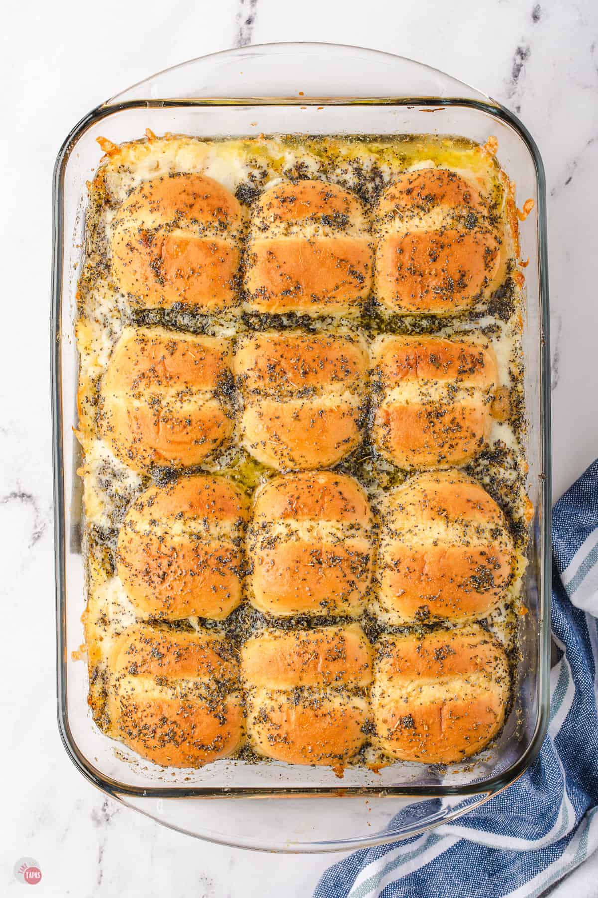 tray of baked pizza sliders