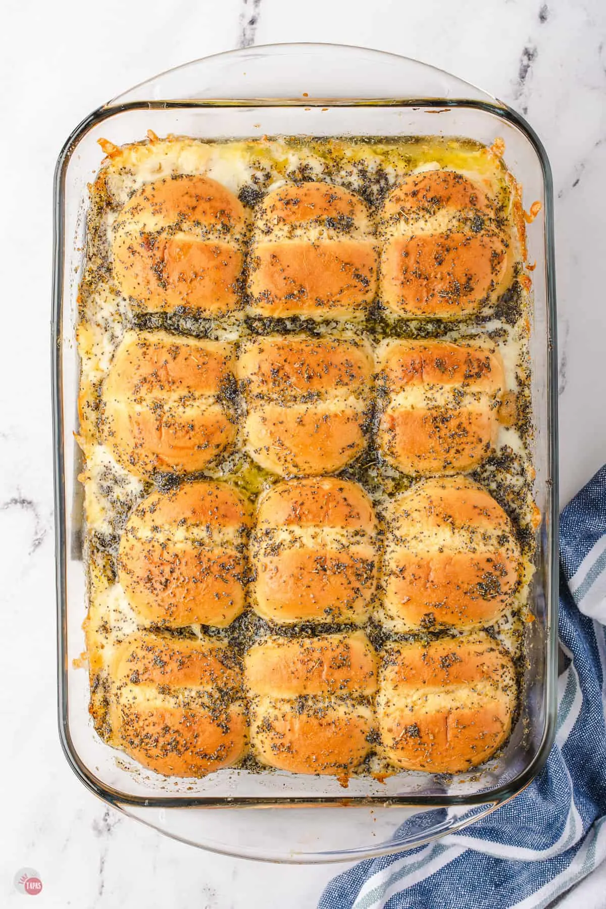 tray of baked pizza sliders