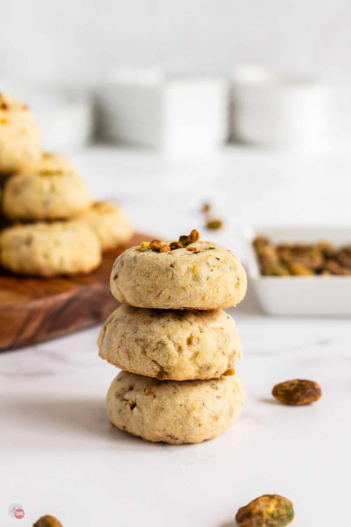 stack of three pistachio cookies