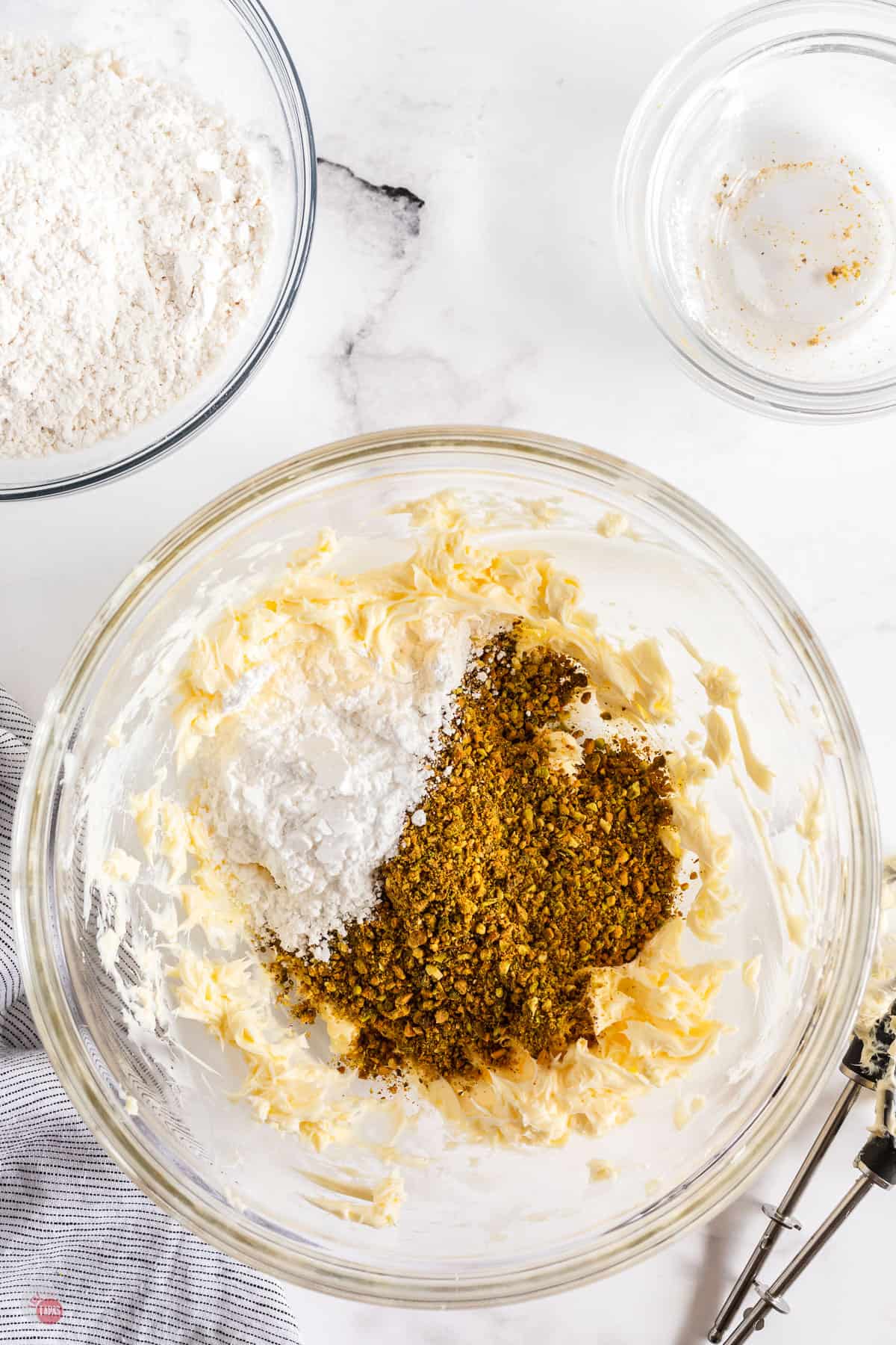 sugar, pistachios, & butter in a mixing bowl