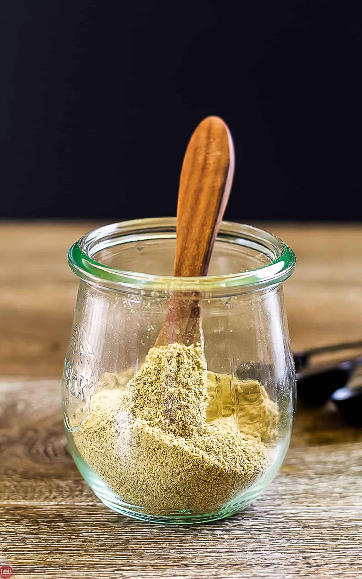 side view of a jar of poultry seasoning