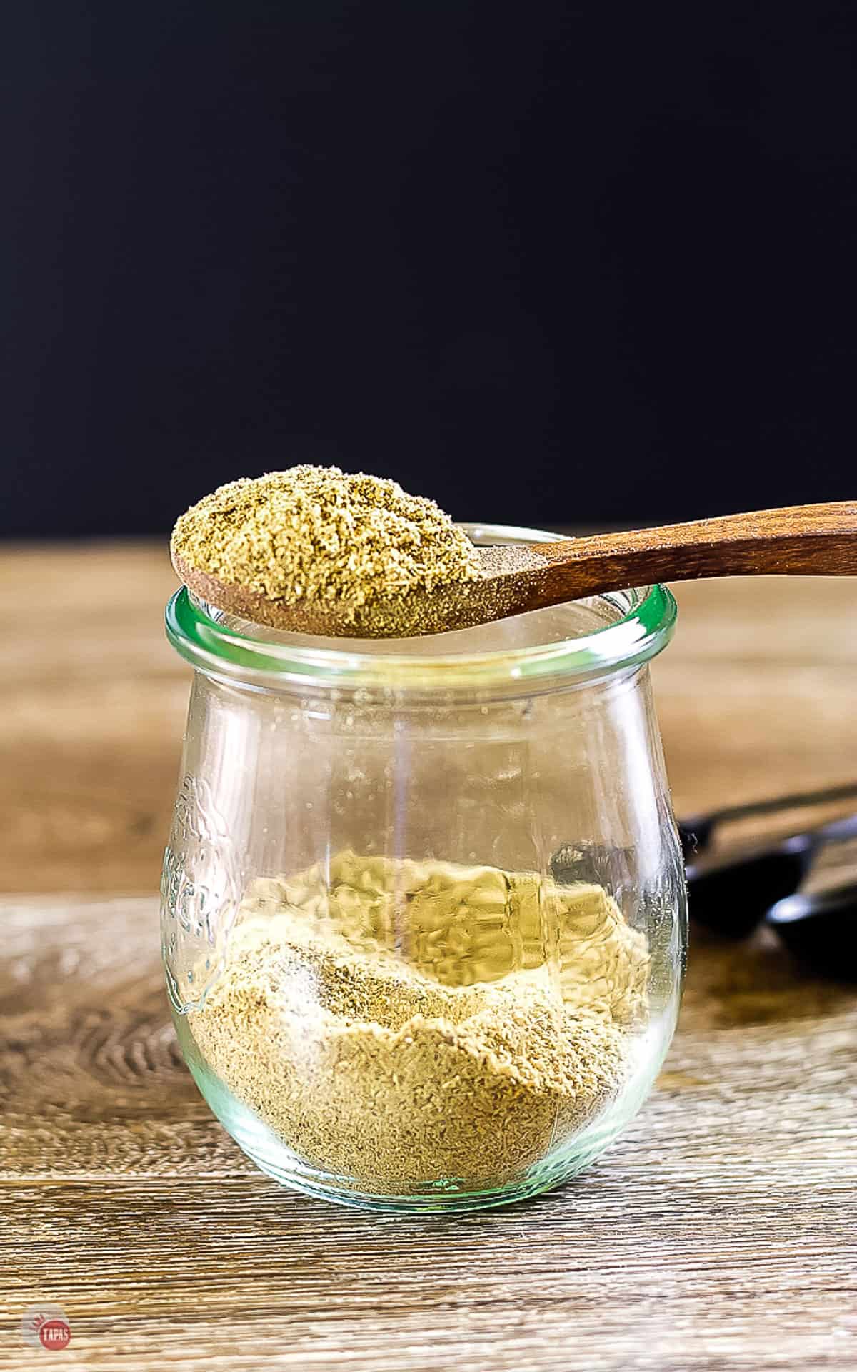 close up of a spoonful of poultry seasoning